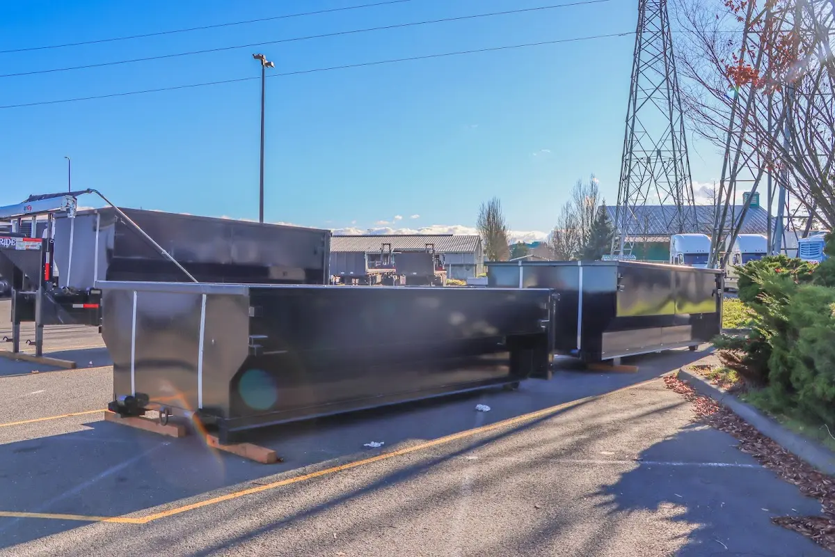 Roll-off dumpster ready for waste disposal at job site for 15 Yard Dumpster Rental in Huntington